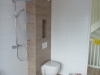 Eindresultaat toilet en douche badkamer
